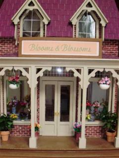 Front of flower shop with flowers