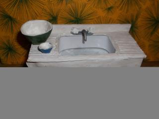 kitchen sink/cabinet. Altoid tin