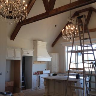 Cathedral ceilings in kitchen with wood beams