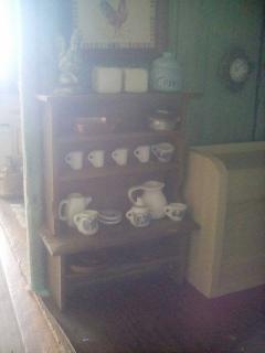 dishes in kitchen hutch